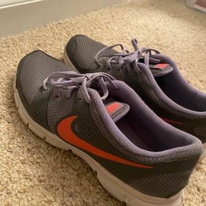 Purple and pink Nike shoes